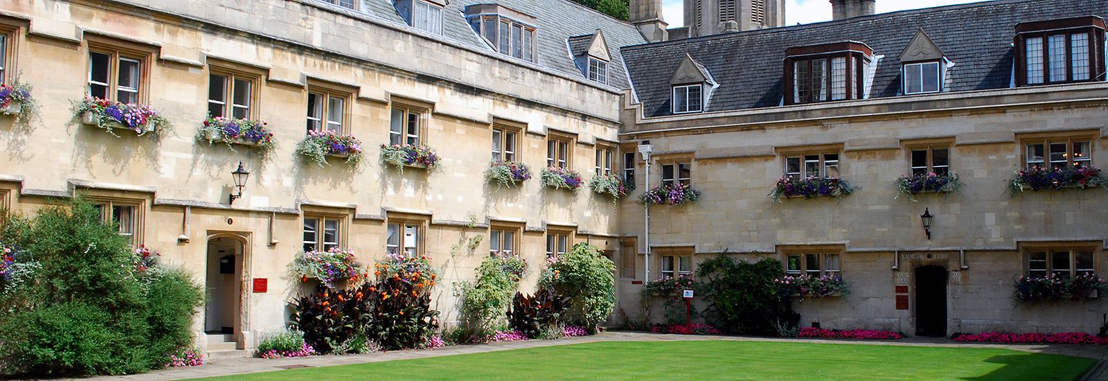 A quad at Pembroke College on a sunny day